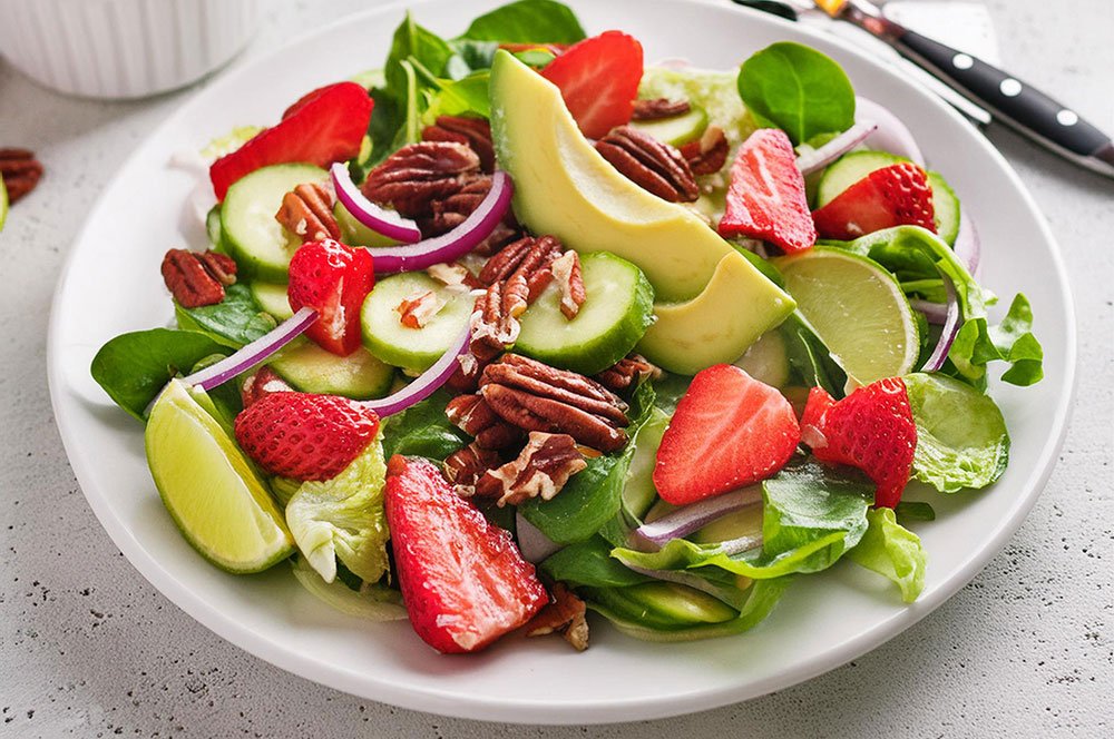 Salads are refreshing on a warm summer day, especially when strawberries are local and in season.
